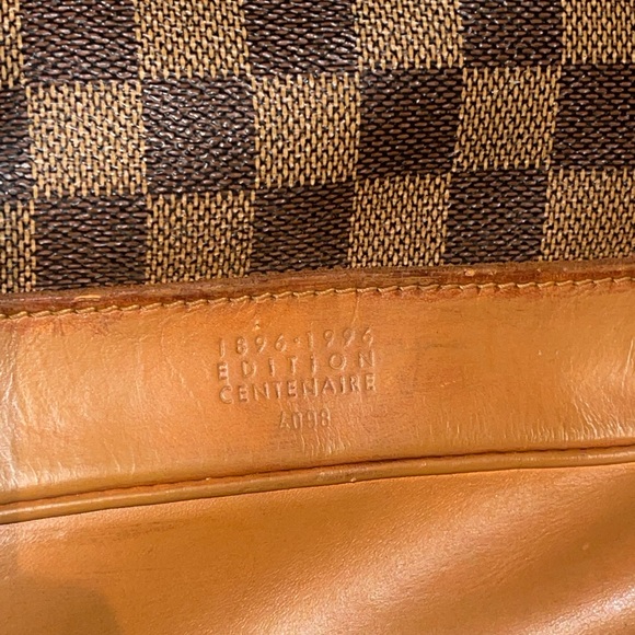 LOUIS VUITTON
The Soho Damier Ebene Centennial Backpack